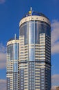 Residential complex Sunny riviera. Text on roof-UKRBUD. Two modern luxury skyscrapers against sky